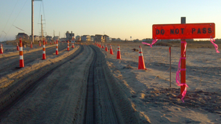 Enterprising North Carolina Tow Truck Drivers Are Taking Cars Across Sandy-Damaged Highway